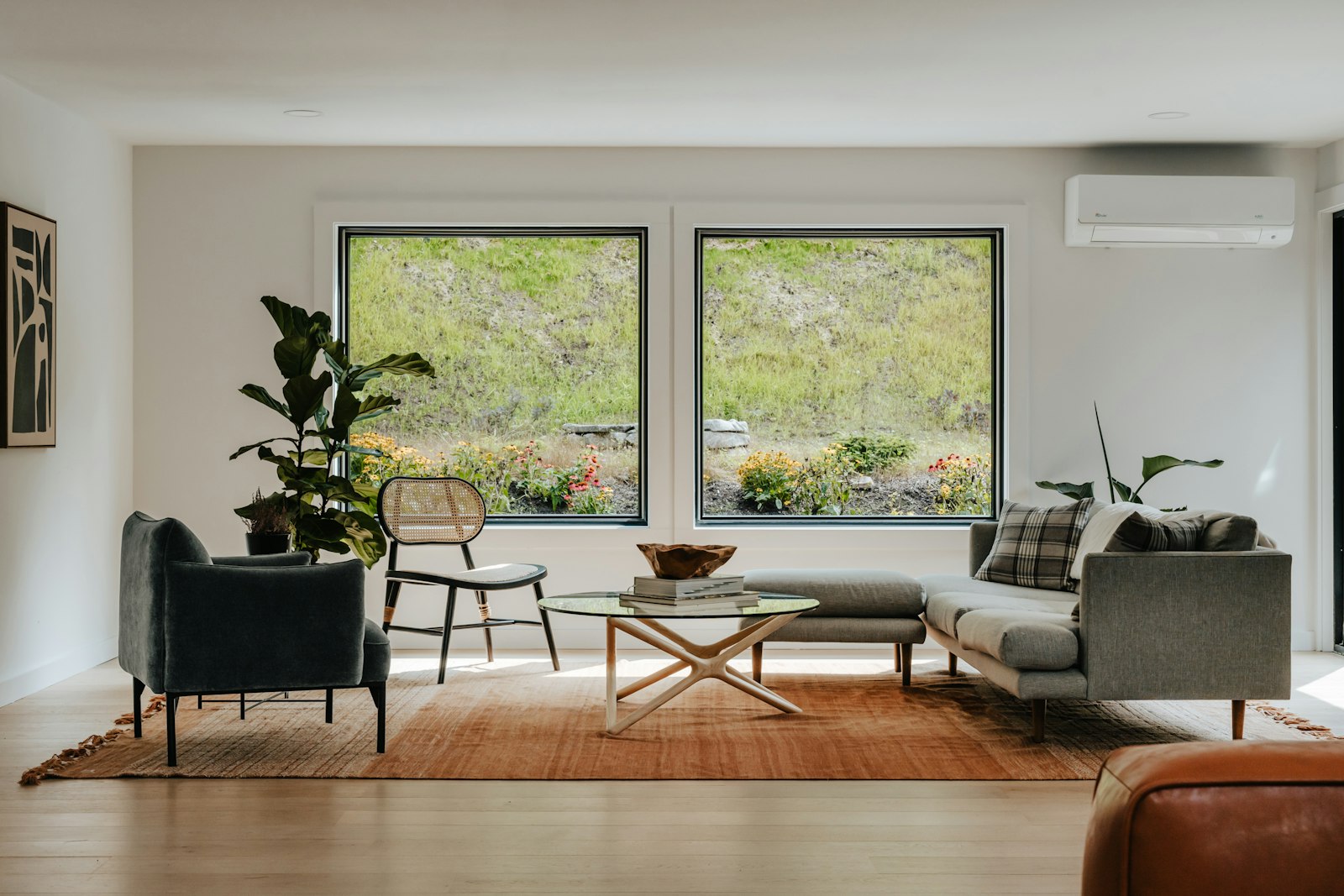 Living room with large windows and blinds